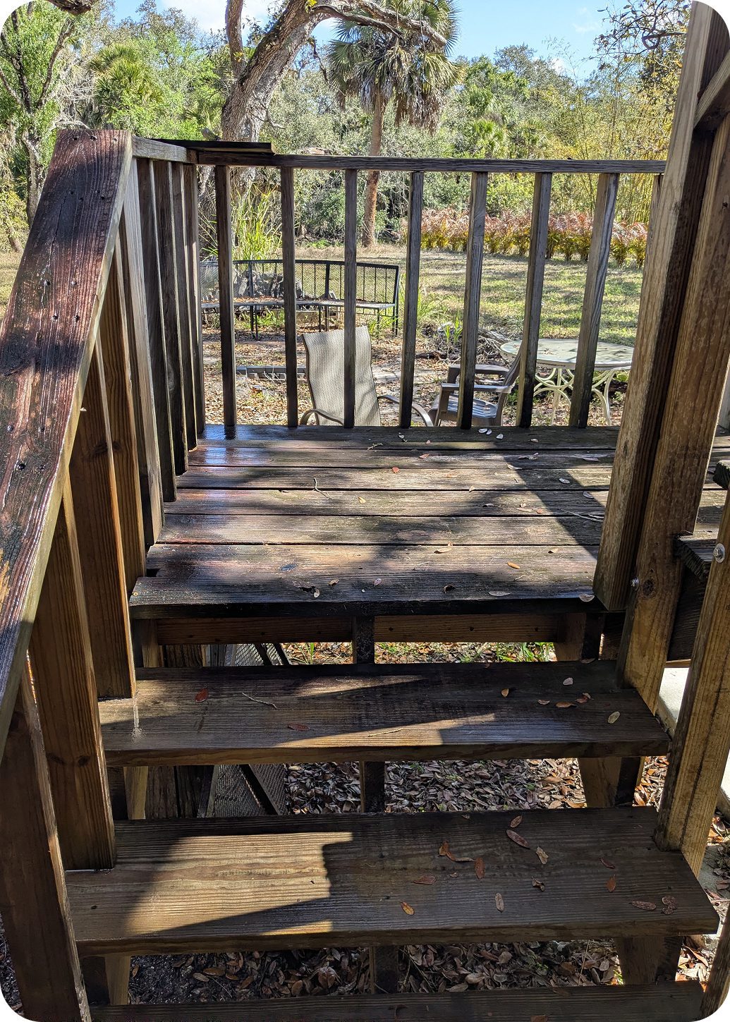 Wooden steps outdoors in sunlight