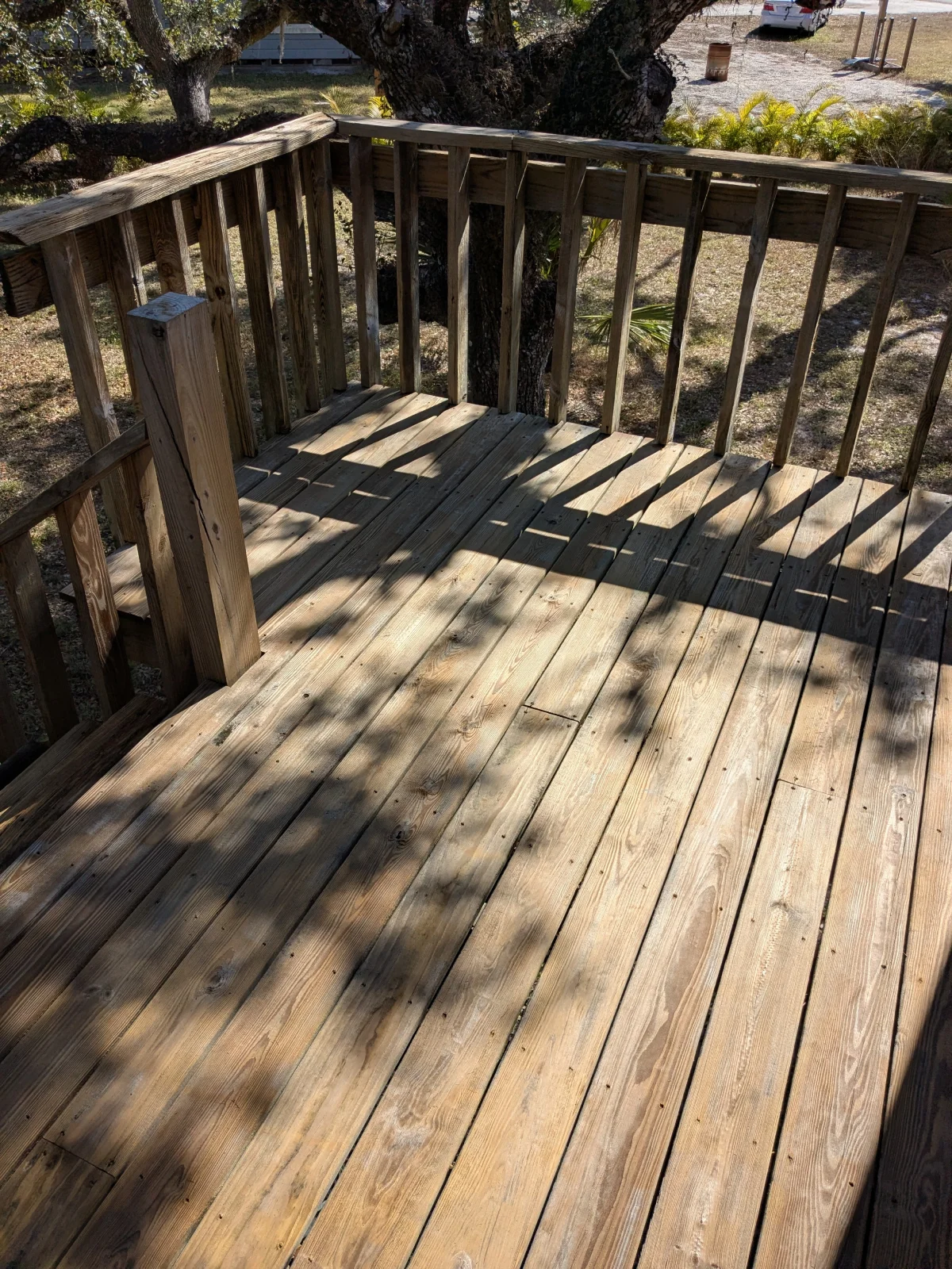 Empty wooden patio in daylight