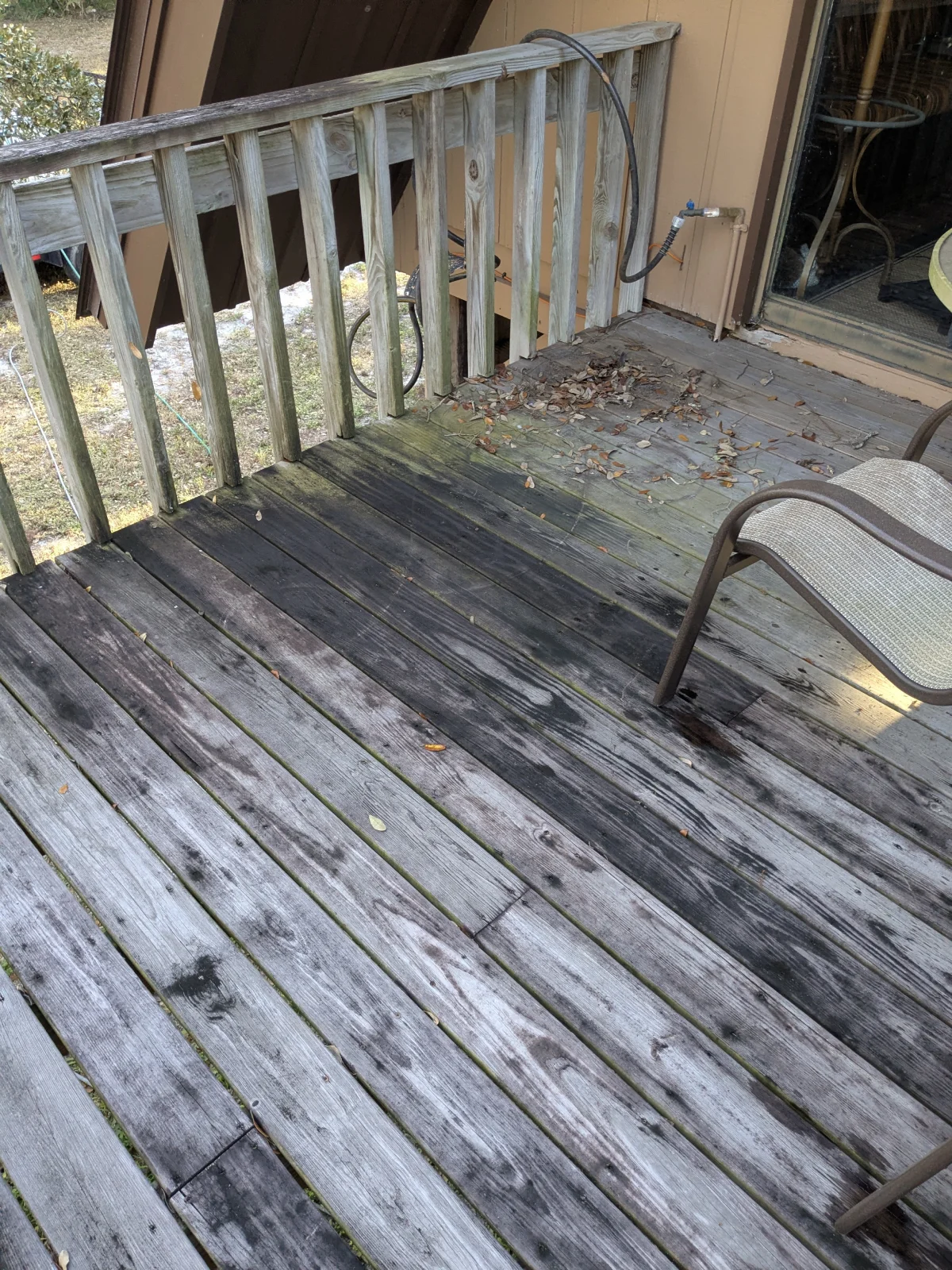 Outdoor deck with aging wood boards
