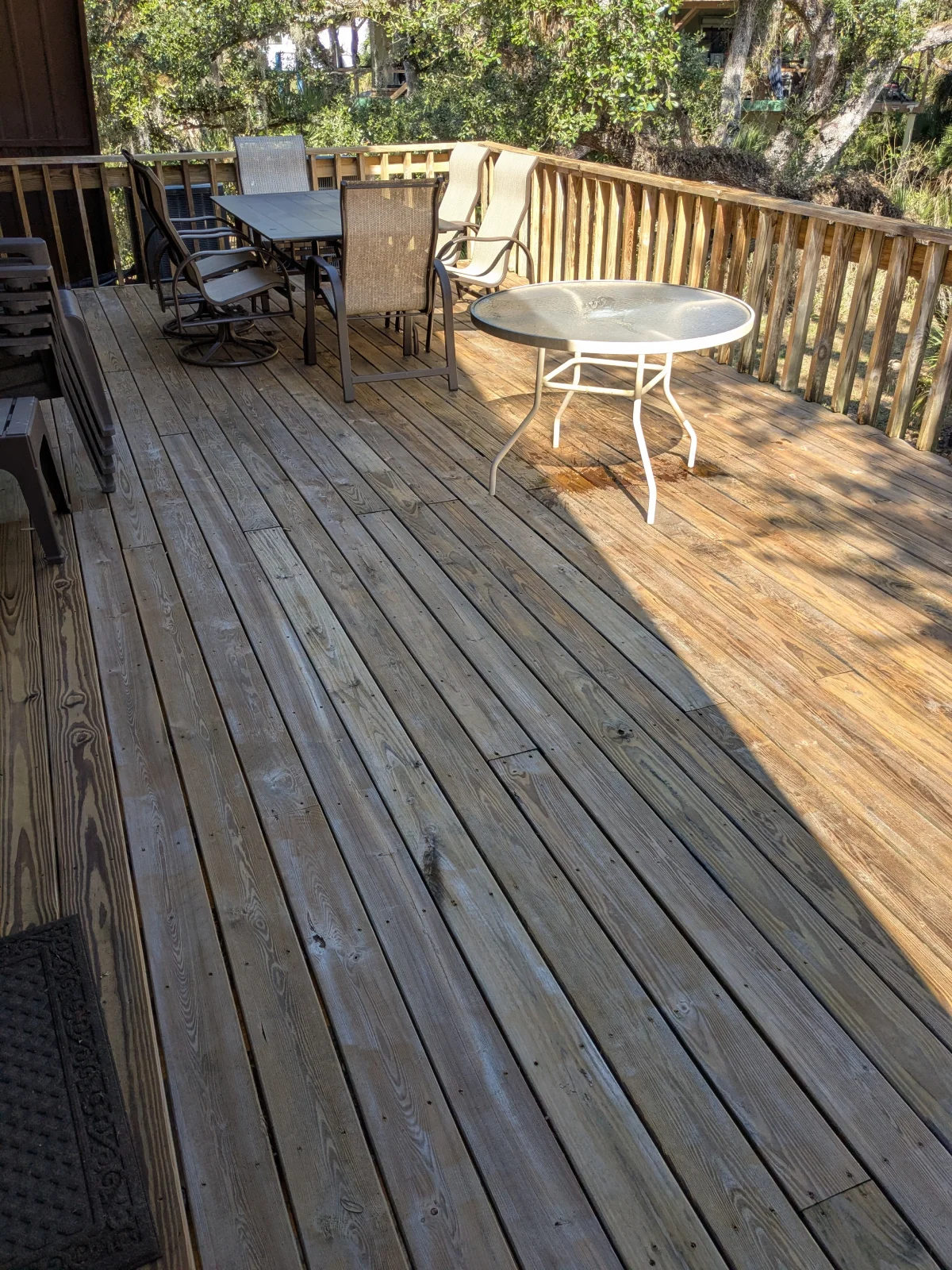 Wooden deck with outdoor dining furniture