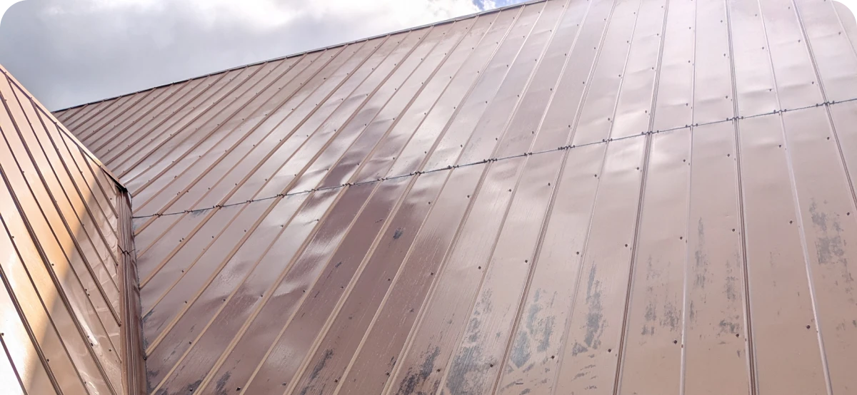 Reflective metal roof surface